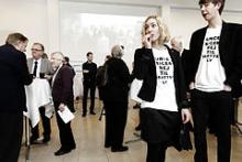 Danske Bank holdt generalforsamling i Tivoli Congress Center den 18. marts 2014. SF Ungdom var mødt op i t-shirts med tekst imod skattely.